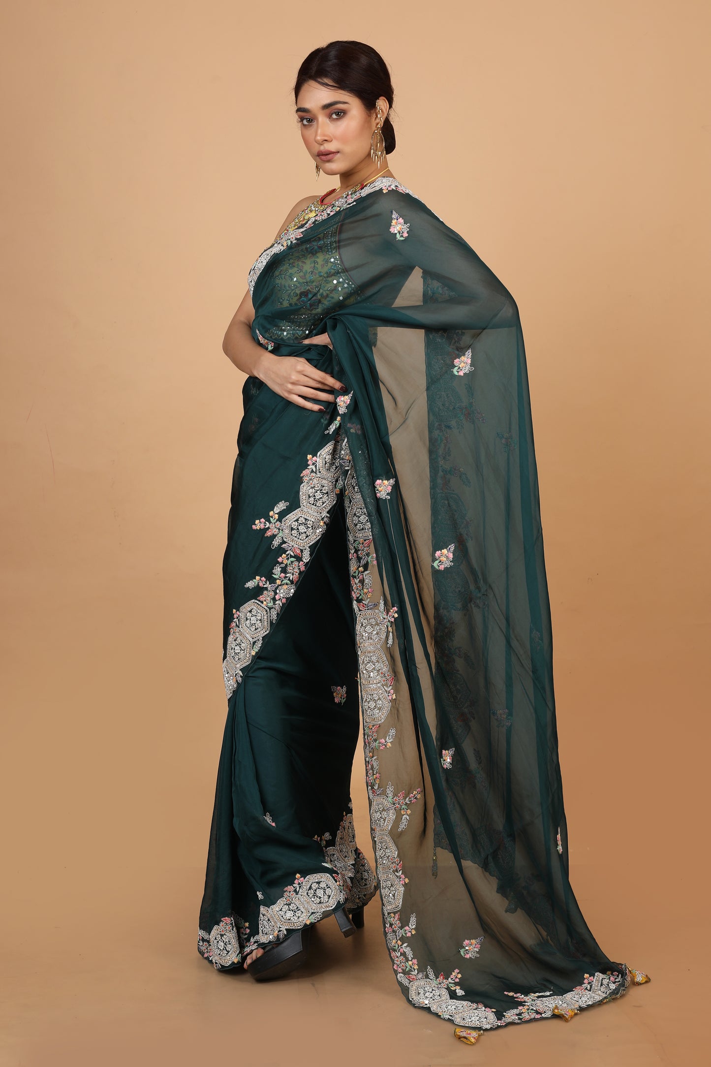 Party Wear Designer Saree In Dark Green Color