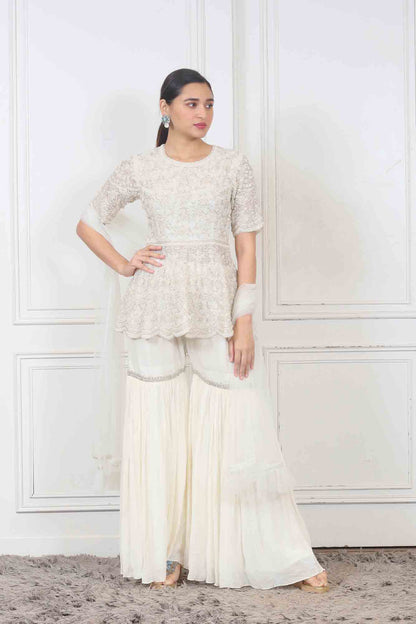 Party wear Sharara set in white color at online simaaya