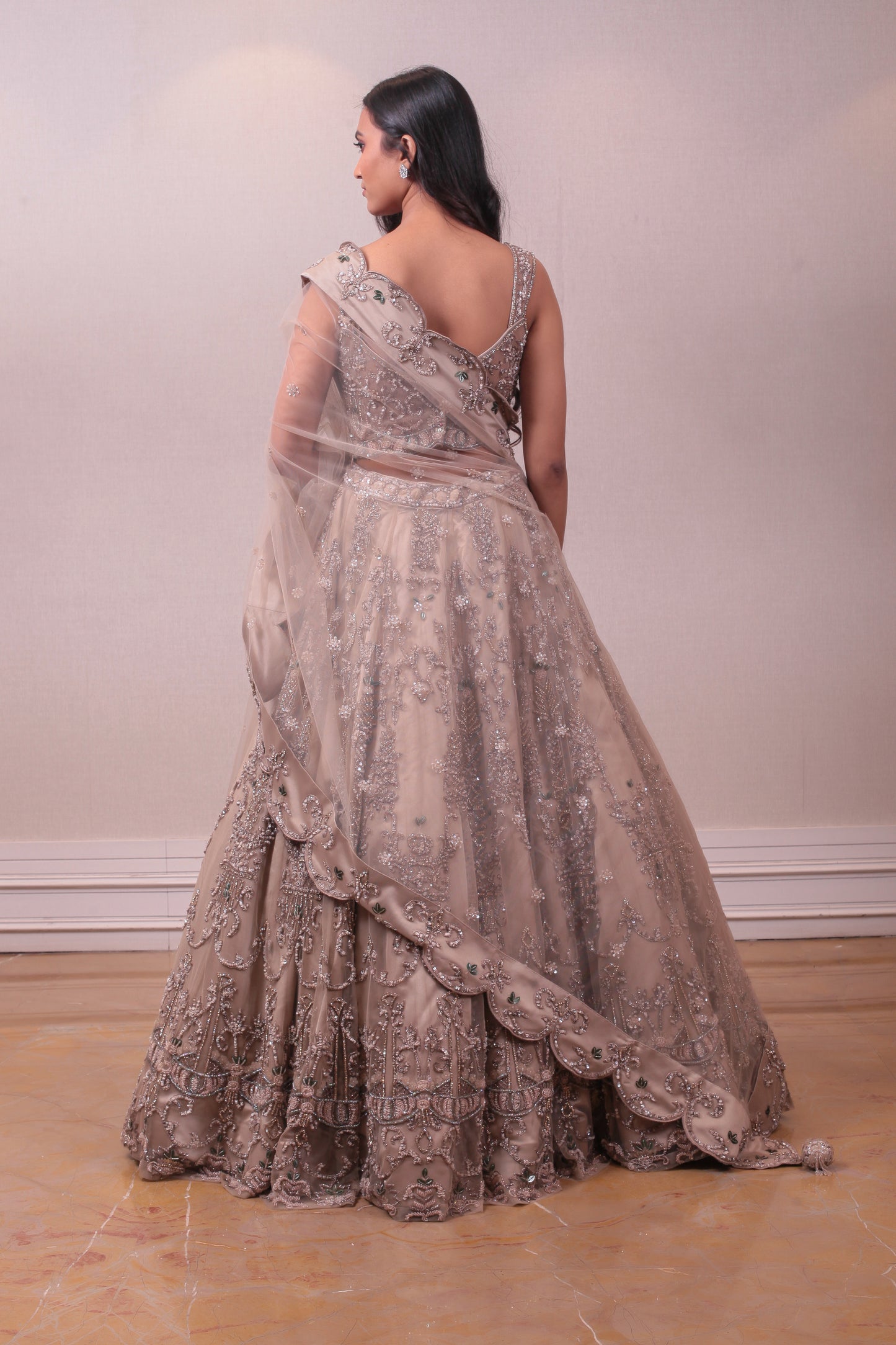 Designer Beige Net Embedded With Satin Lehenga