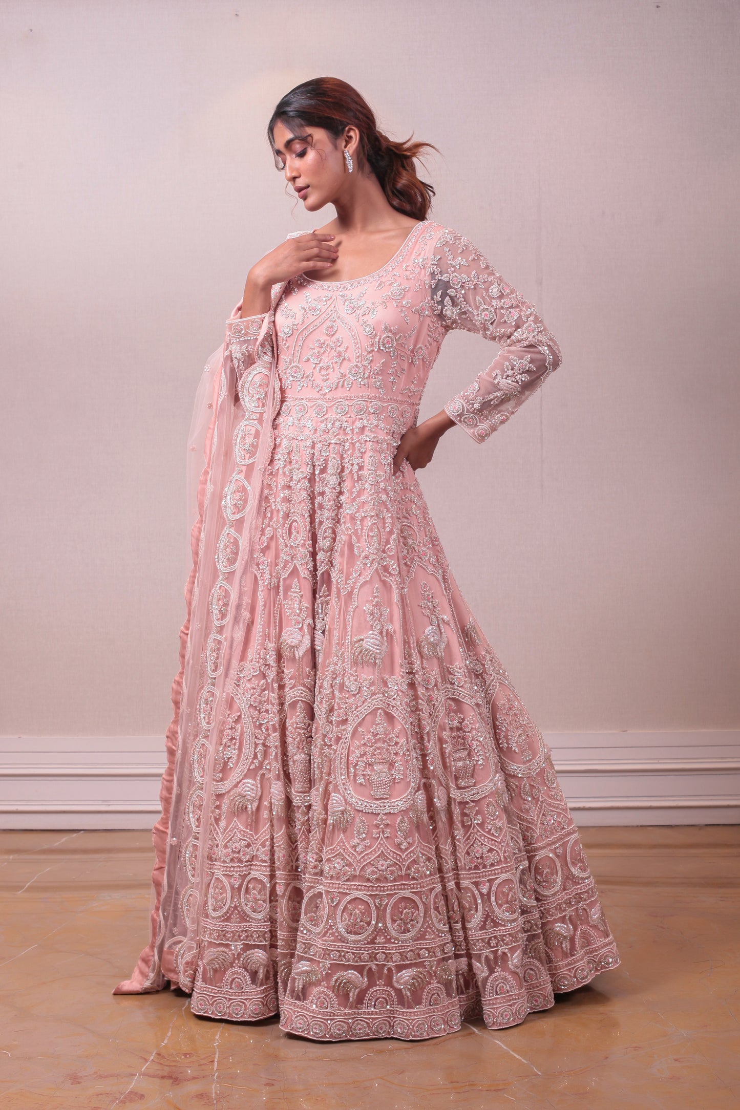 Designer Peach Net Embodied Gown