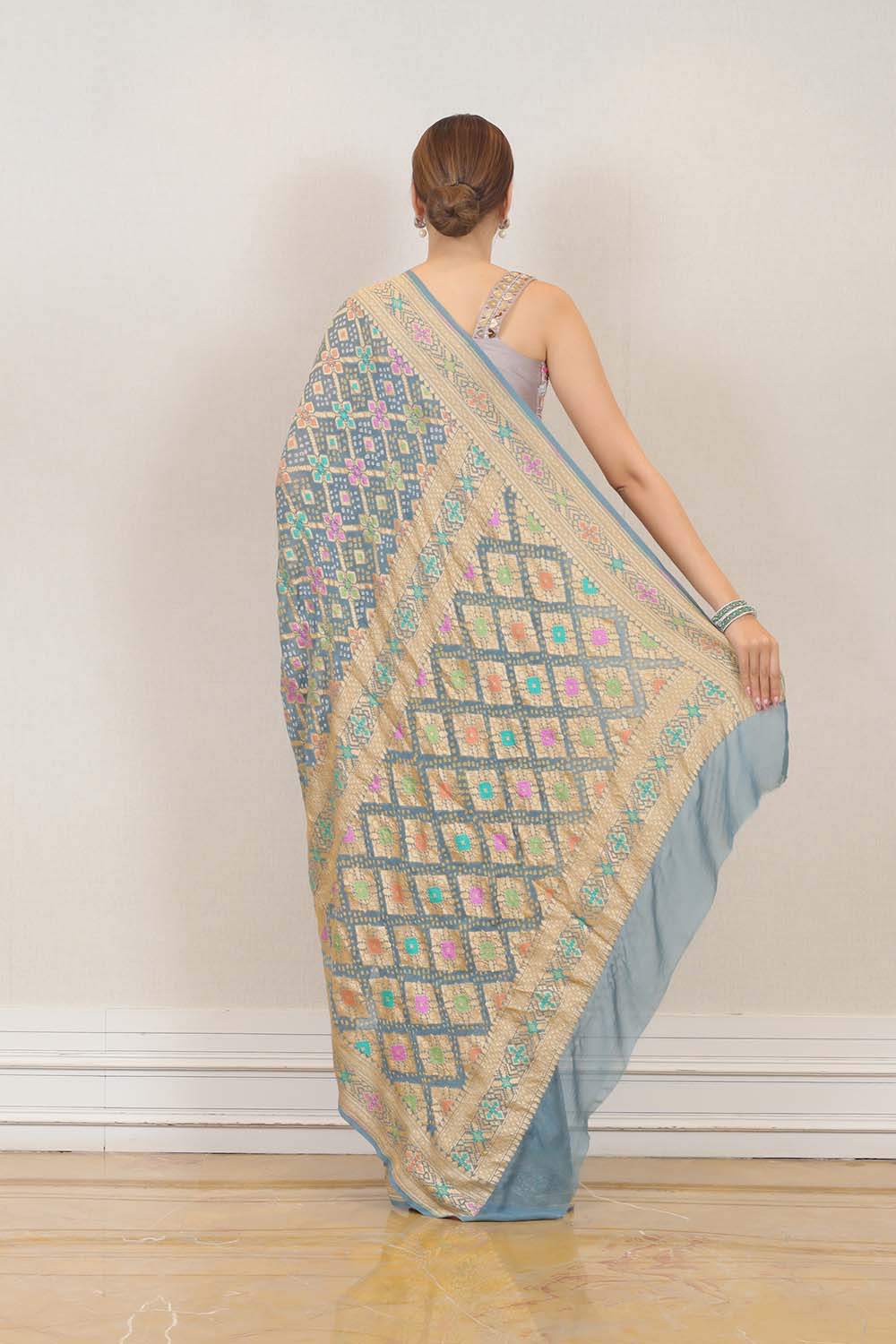 Party Wear Bandhej saree in Sky Blue color at online Simaaya